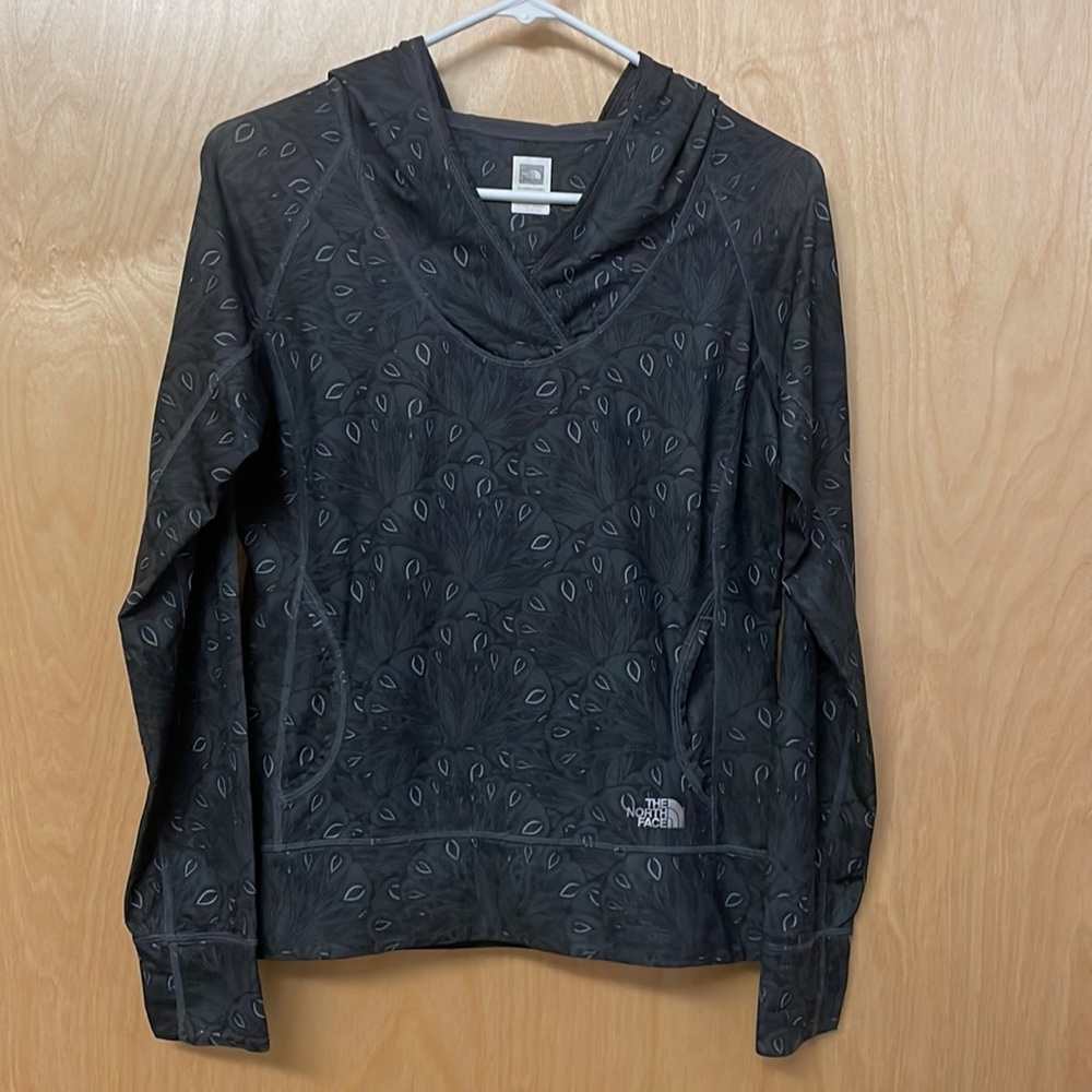 The North Face lightweight, pullover hoodie. In perfect condition. V-neck hood.